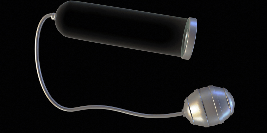 A photo of a grey Vacuum Penis Pumps for Men in a black background. 